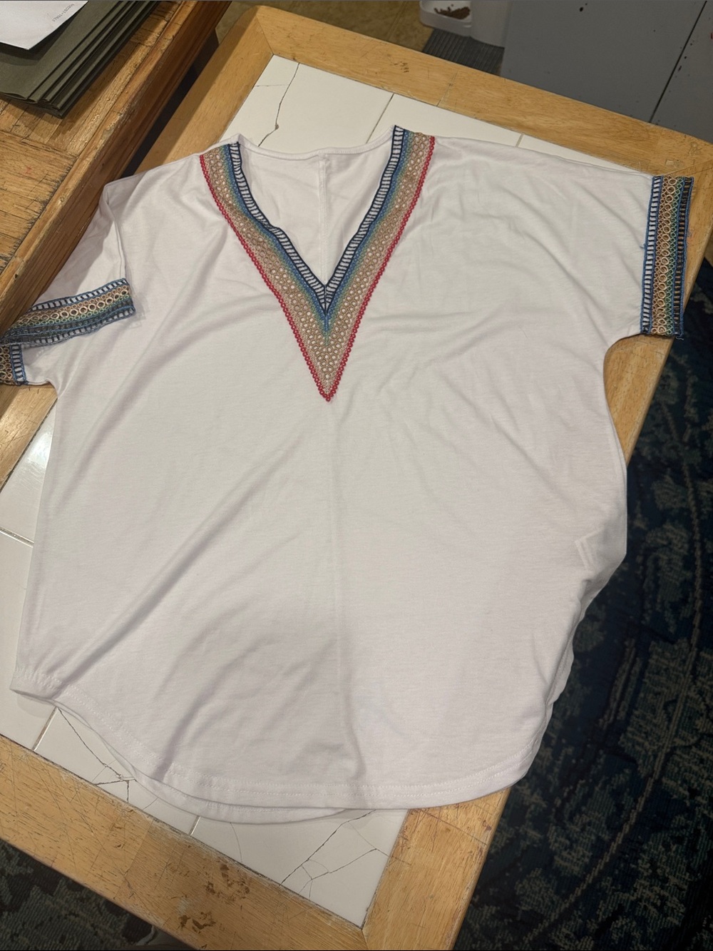White Embroidered V-Neck Top with Blue, Tan & Red Trim